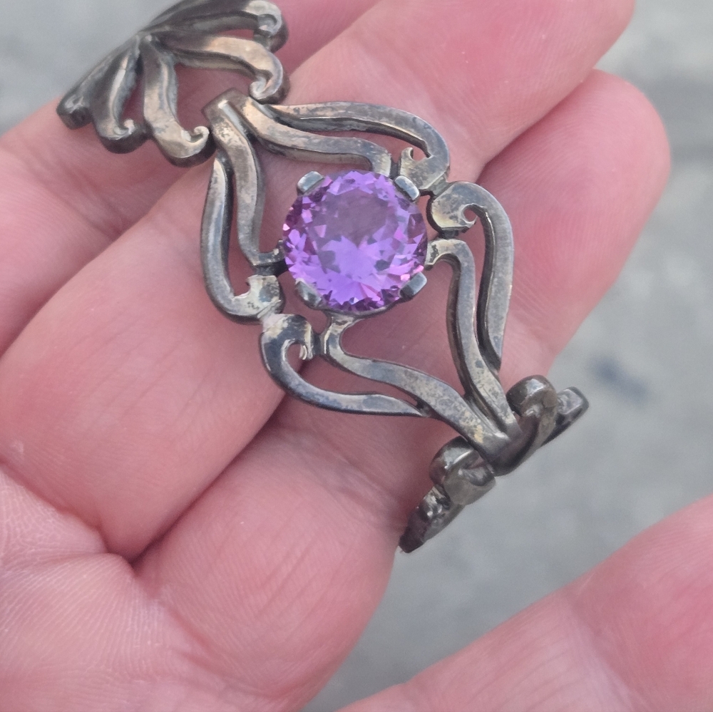 Vtg. bracelet, ornate. Possiblly sterling w/amethyst.
